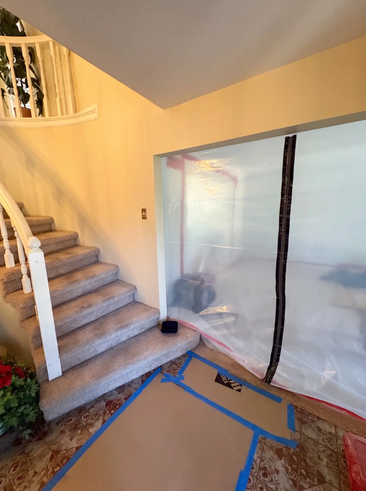 Containment barrier set up on a Michigan stairway during a water damage mitigation job